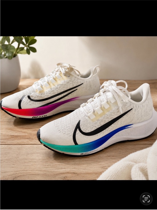 Nike Shoes - Nike Women's White Running Shoes with Rainbow Gradient Swoosh Accents